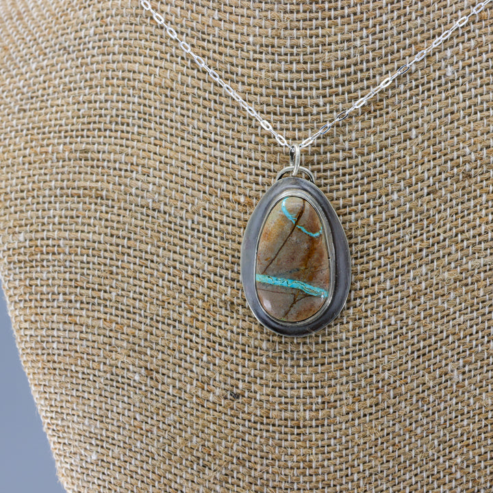 handmade ribbon turquoise oval shaped pendant necklace OOAK on a burlap bust