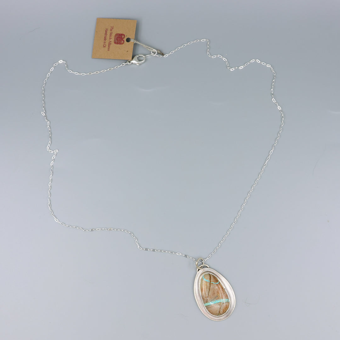 handmade ribbon turquoise oval shaped pendant necklace OOAK on a gray background