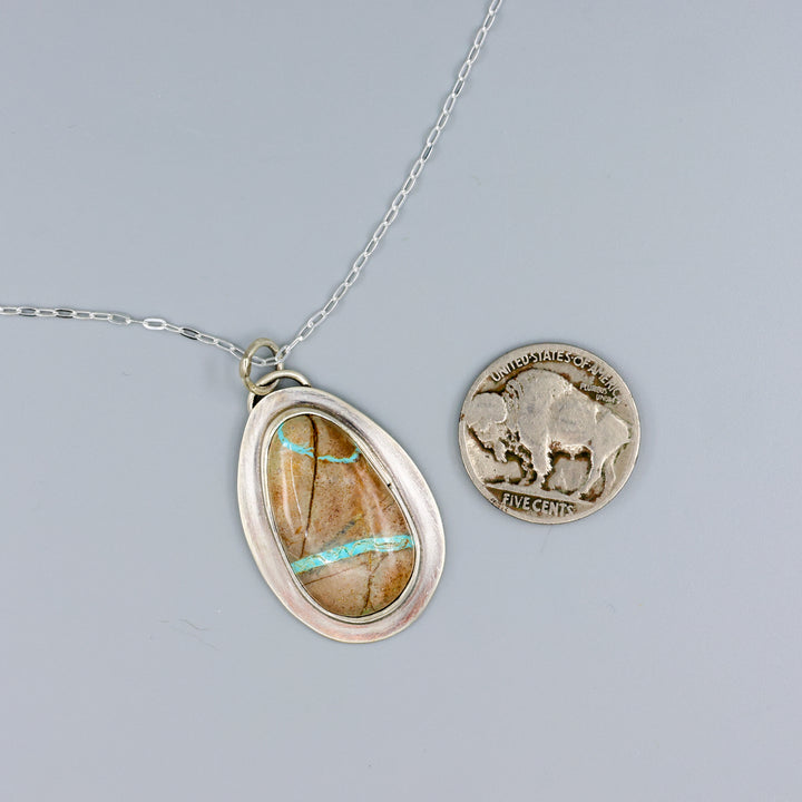handmade ribbon turquoise oval shaped pendant necklace OOAK with a nickel for size comparison