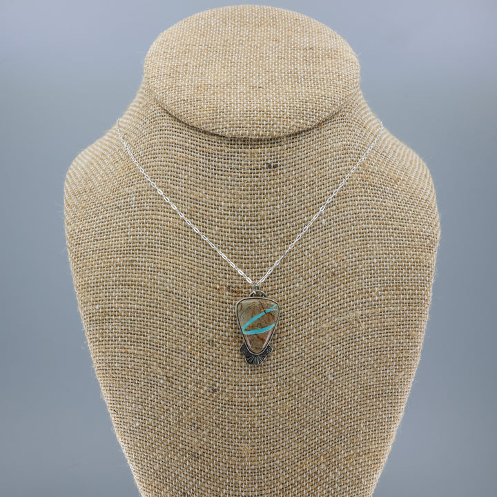 ribbon turquoise pendant one-of-a-kind necklace on a burlap display