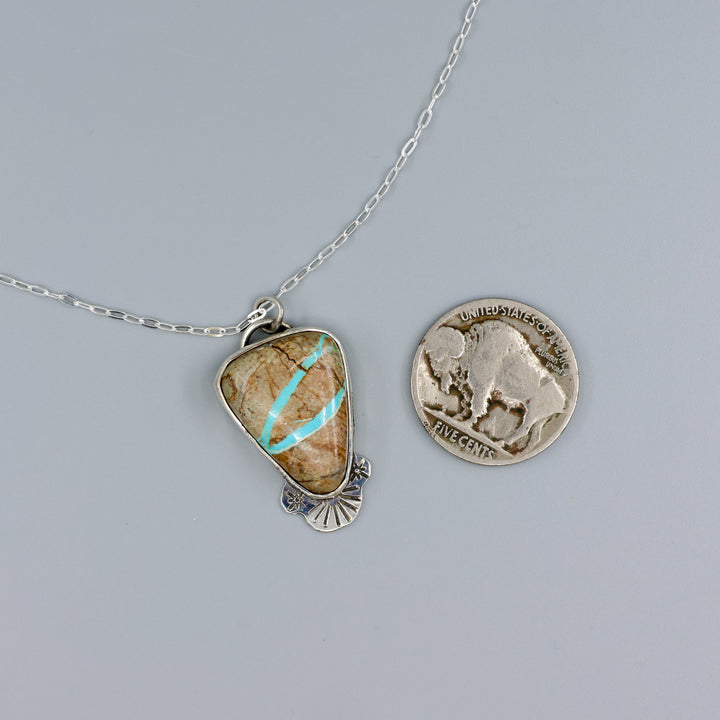 ribbon turquoise pendant one-of-a-kind necklace with a nickel for size comparison
