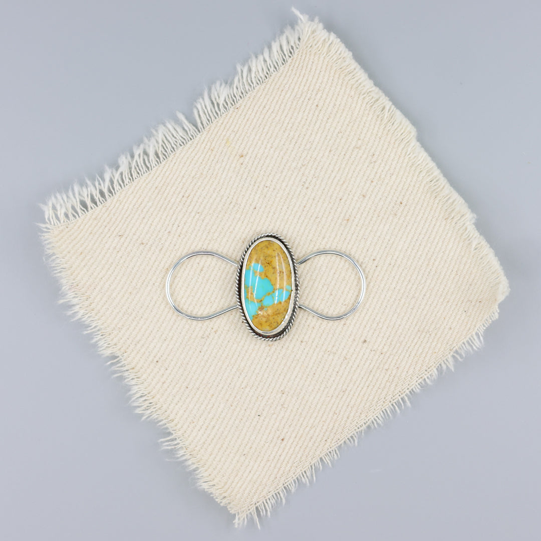 handmade one of a. kind royston turquoise sterling silver twilly on a white background