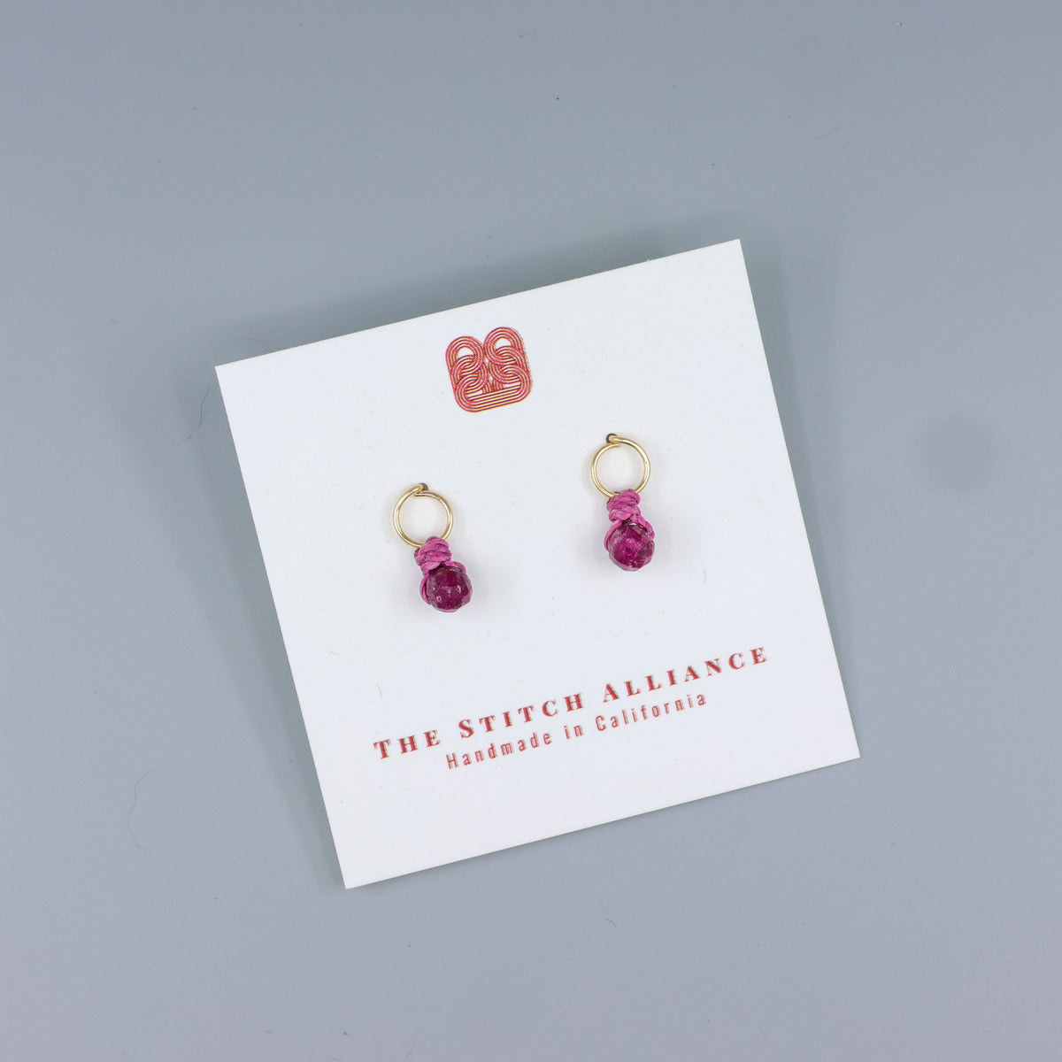 gold filled ruby mini dangle earrings handmade  on a white card