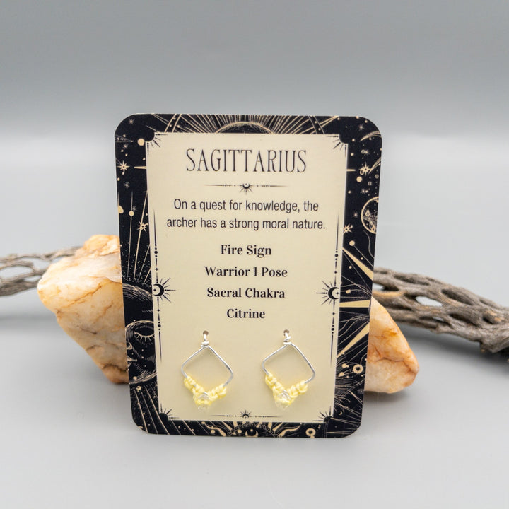 Sagittarius citrine earrings in sterling silver showing the front of the card
