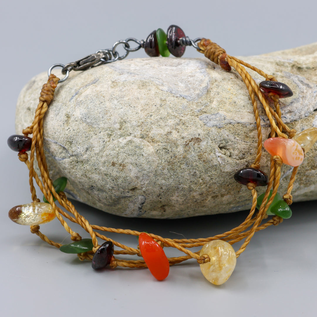 handknotted gemstone, cord, and oxidezed stelring silver bracelet