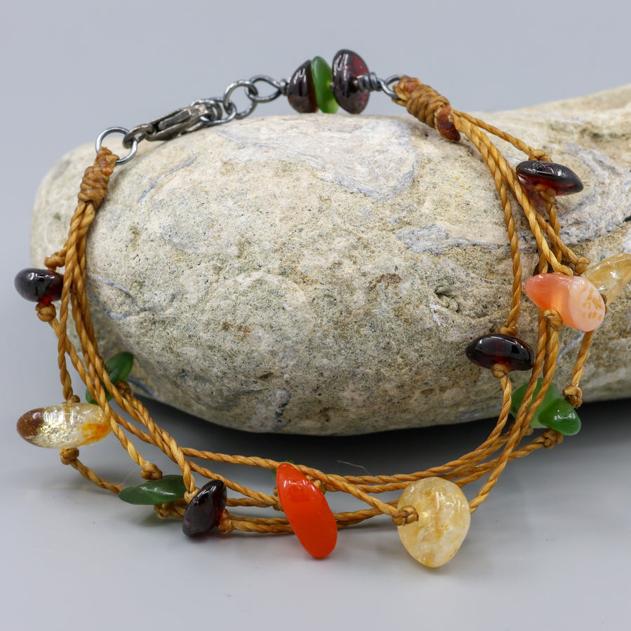 handknotted gemstone, cord, and oxidezed stelring silver bracelet