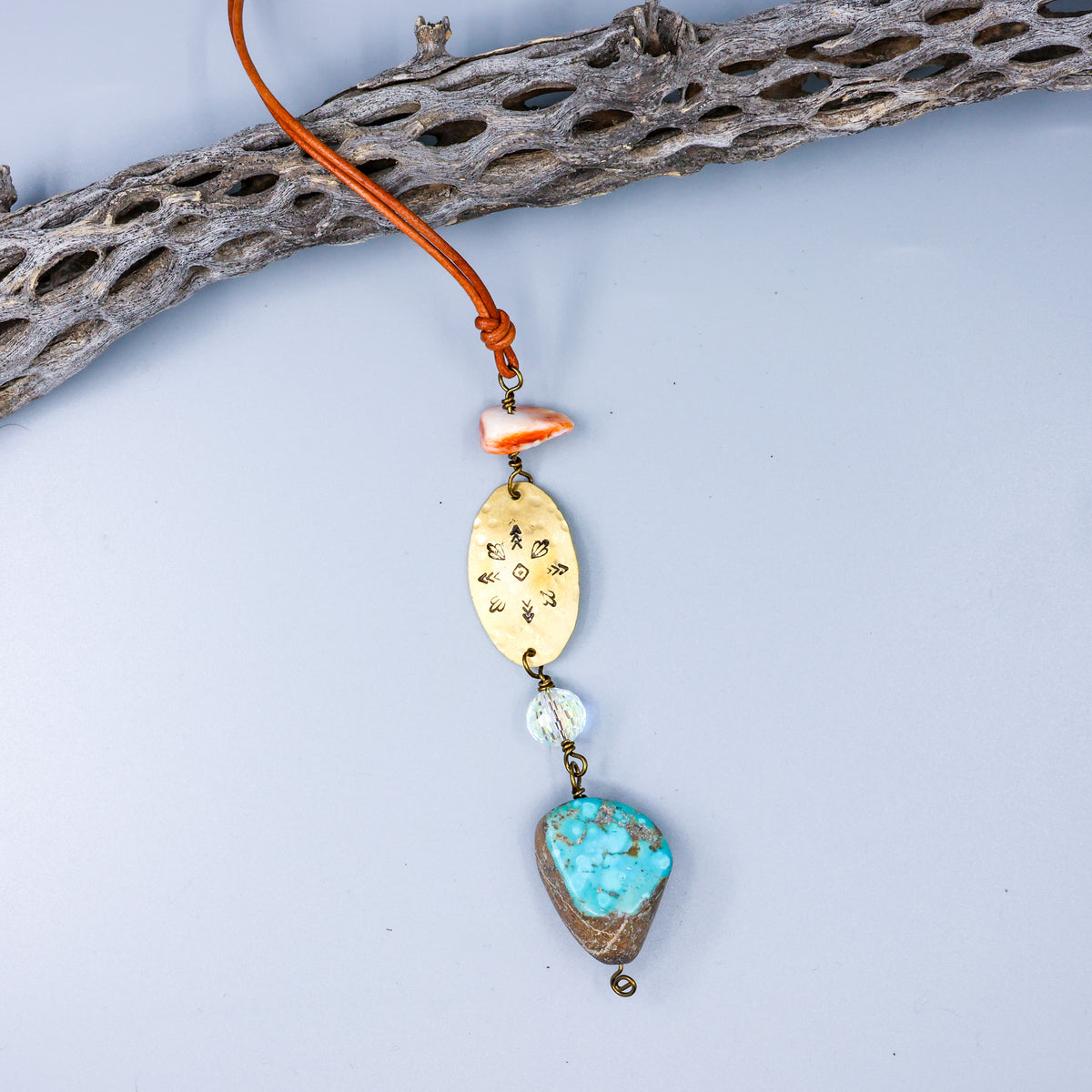 handmade brass, turquoise, and spiny oyster sun catcher
