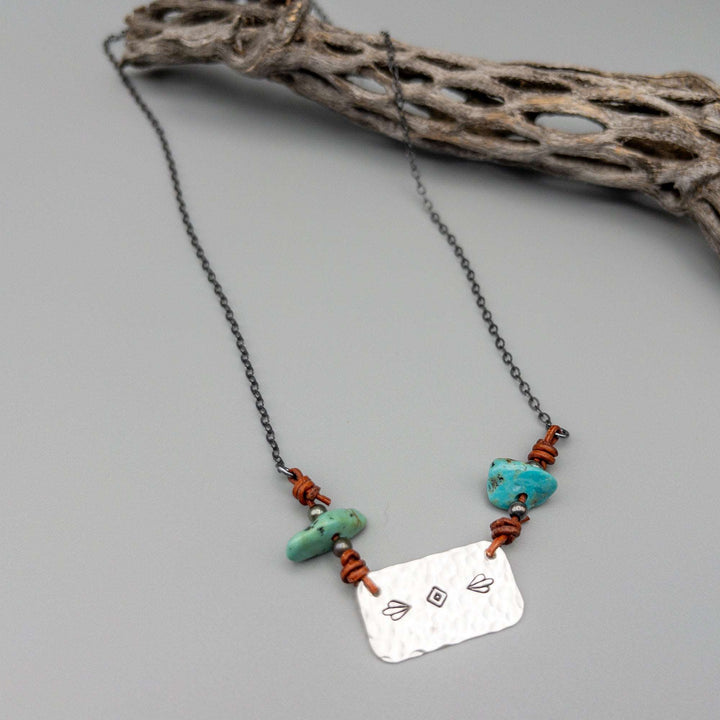 southwest silver stamped necklace with turquoise beads from the kingman mine