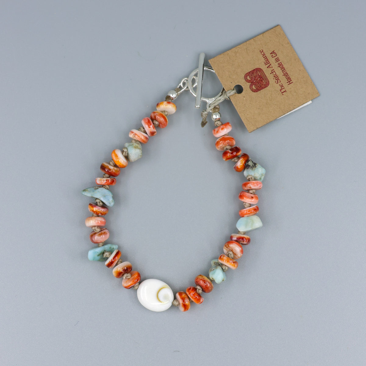 handmade shiva shell, larimar, and spiny oyster beaded bracelet with sterling silver