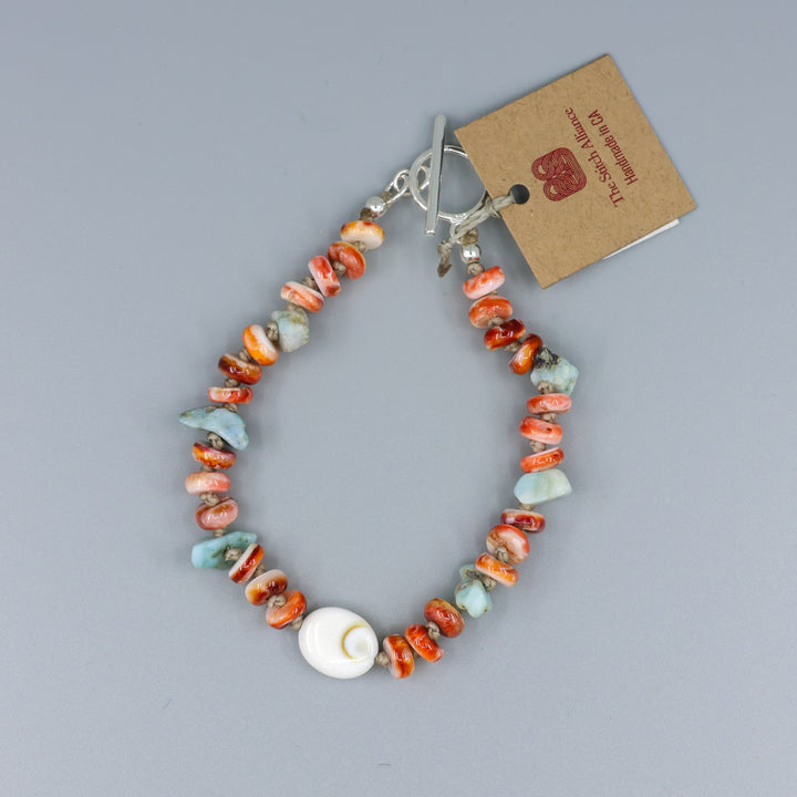 handmade shiva shell, larimar, and spiny oyster beaded bracelet with sterling silver