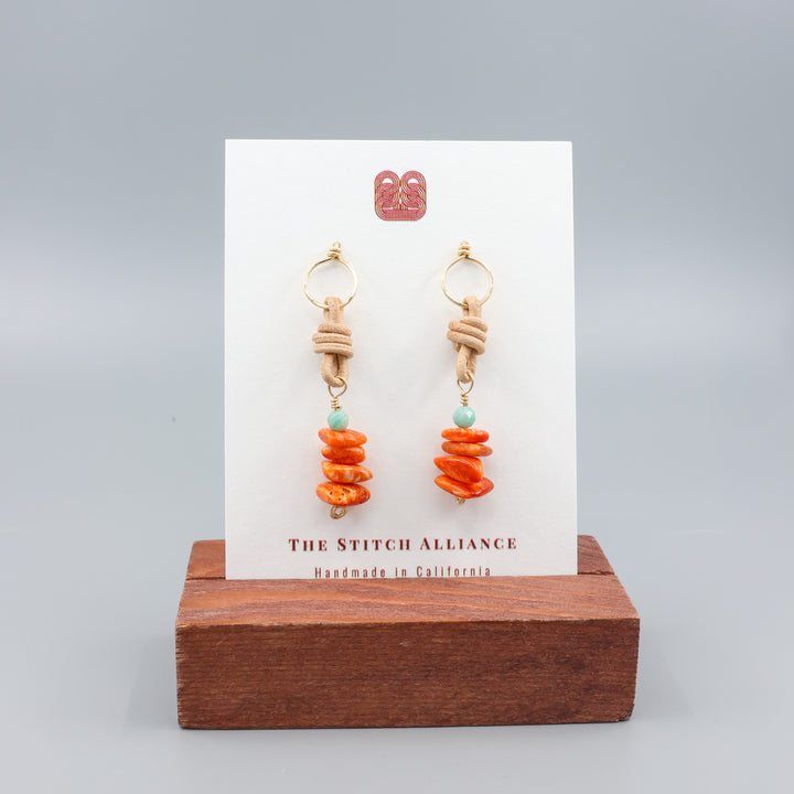 handmade gold, spiny oyster, and amazonite leather drop earrings 