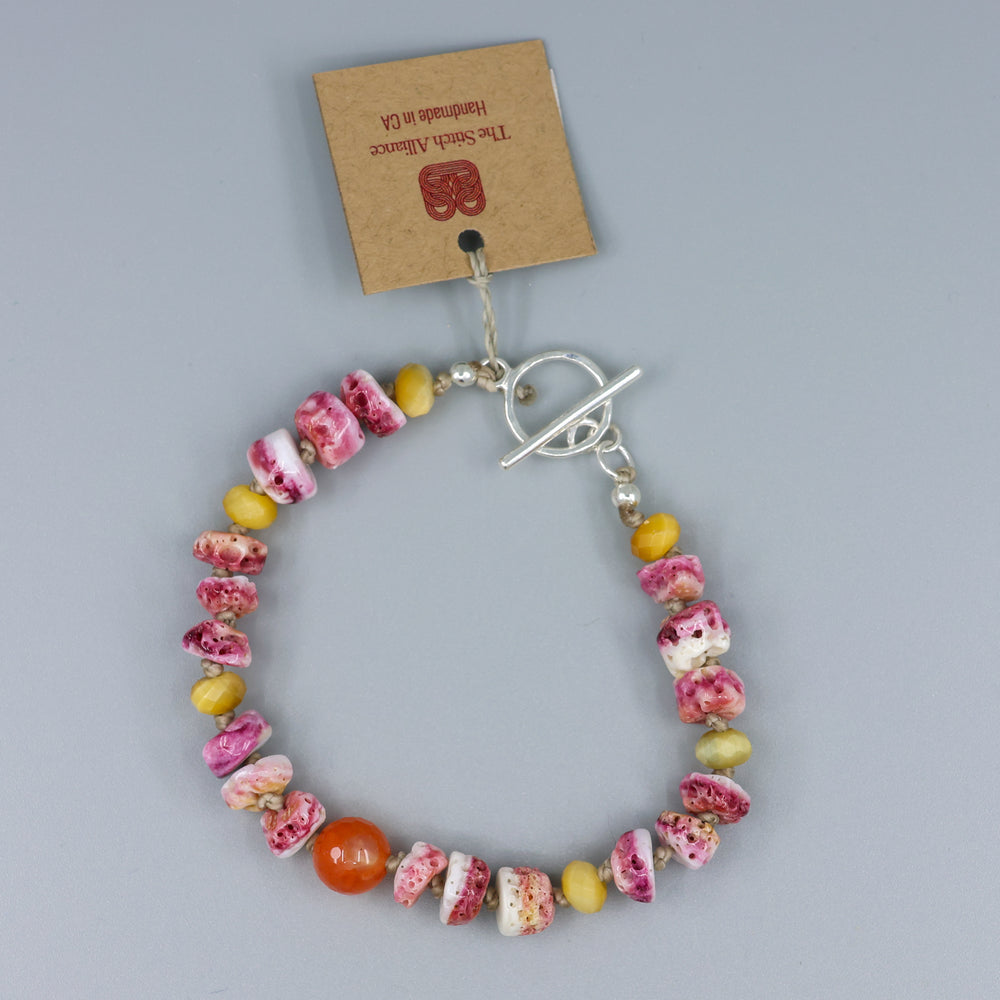 shiva shell, botswana agate, golden tigers eye hand knotted bracelet with silver clasp