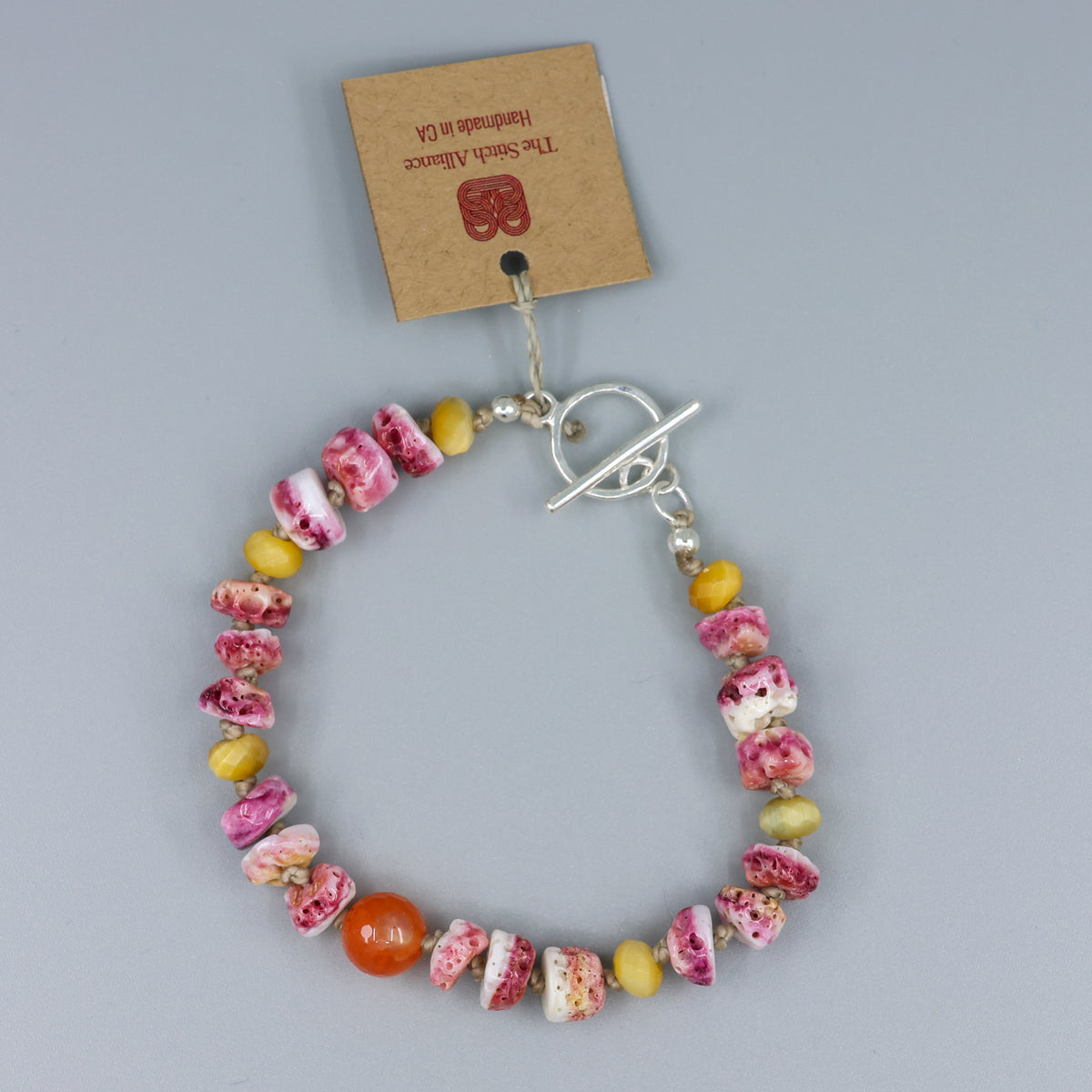 shiva shell, botswana agate, golden tigers eye hand knotted bracelet with silver clasp
