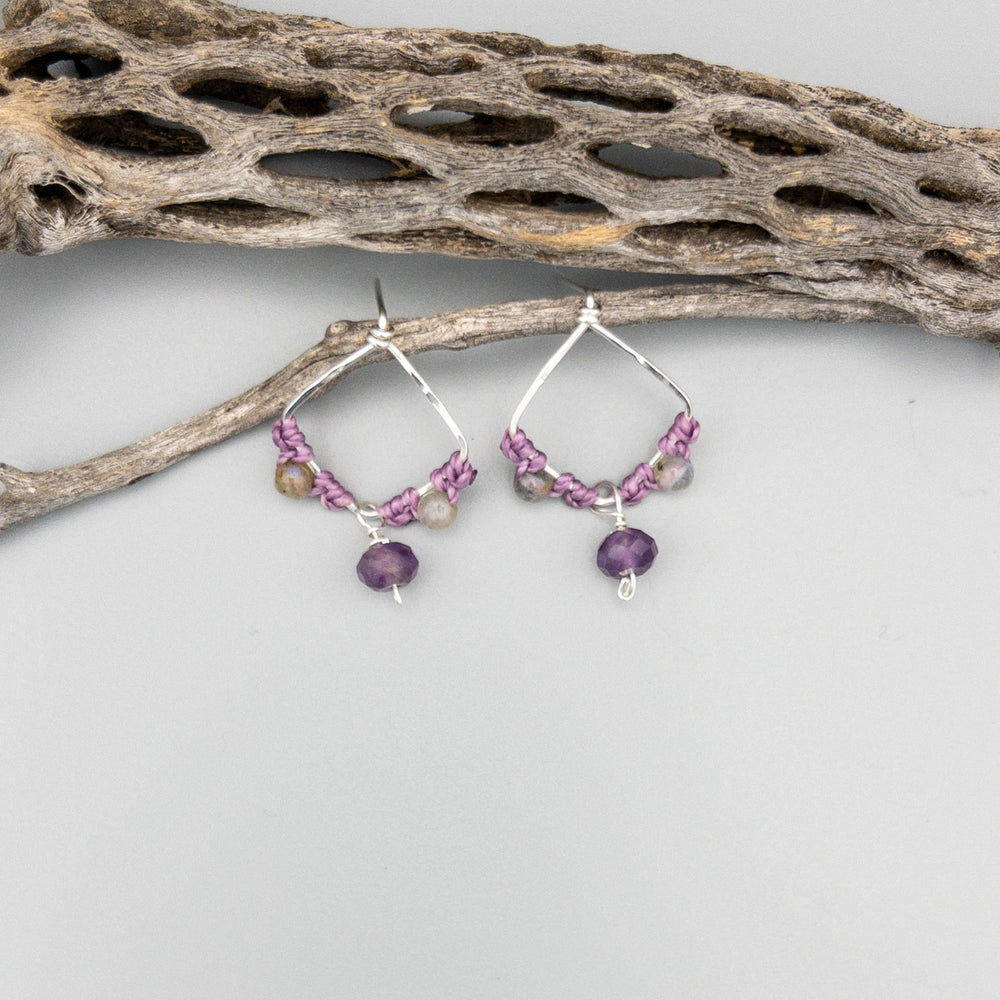 amethyst and labradorite sterling silver macrame earrings on a gray background
