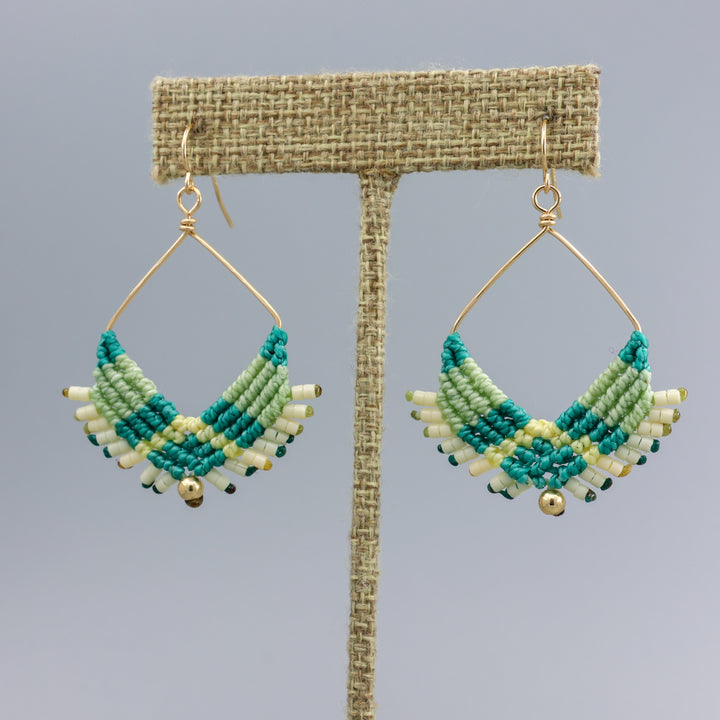handmade macrame statement hoop earrings with gold fill wire on a linen hanger