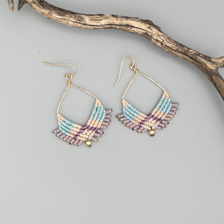 spring inspired gold filled macrame square hoop earrings on a gray background