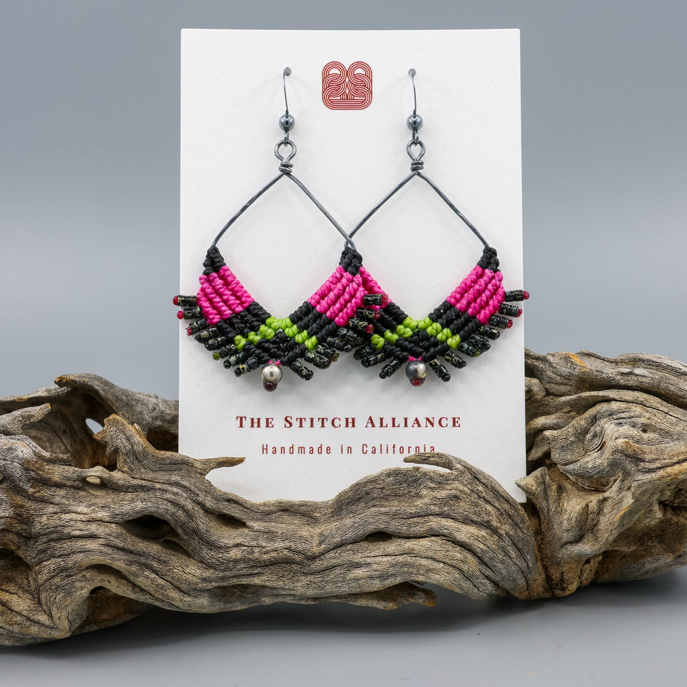 handmade square hoop macrame earrings in oxidized sterling silver with black, pink, and green colors on a white card