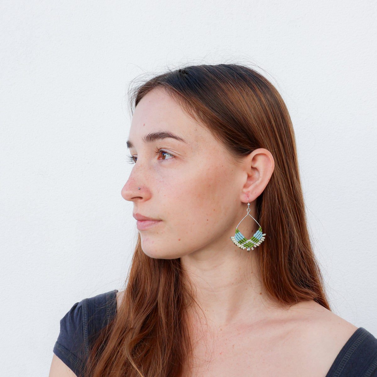 handmade sterling silver macrame square hoop earrings with light blue and green cords