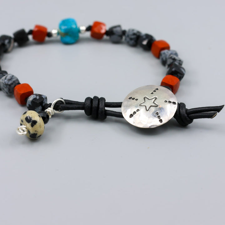 handmade turquoise, jasper, and larvikite beaded bracelet with a star-stamped sterling silver button closure  detail