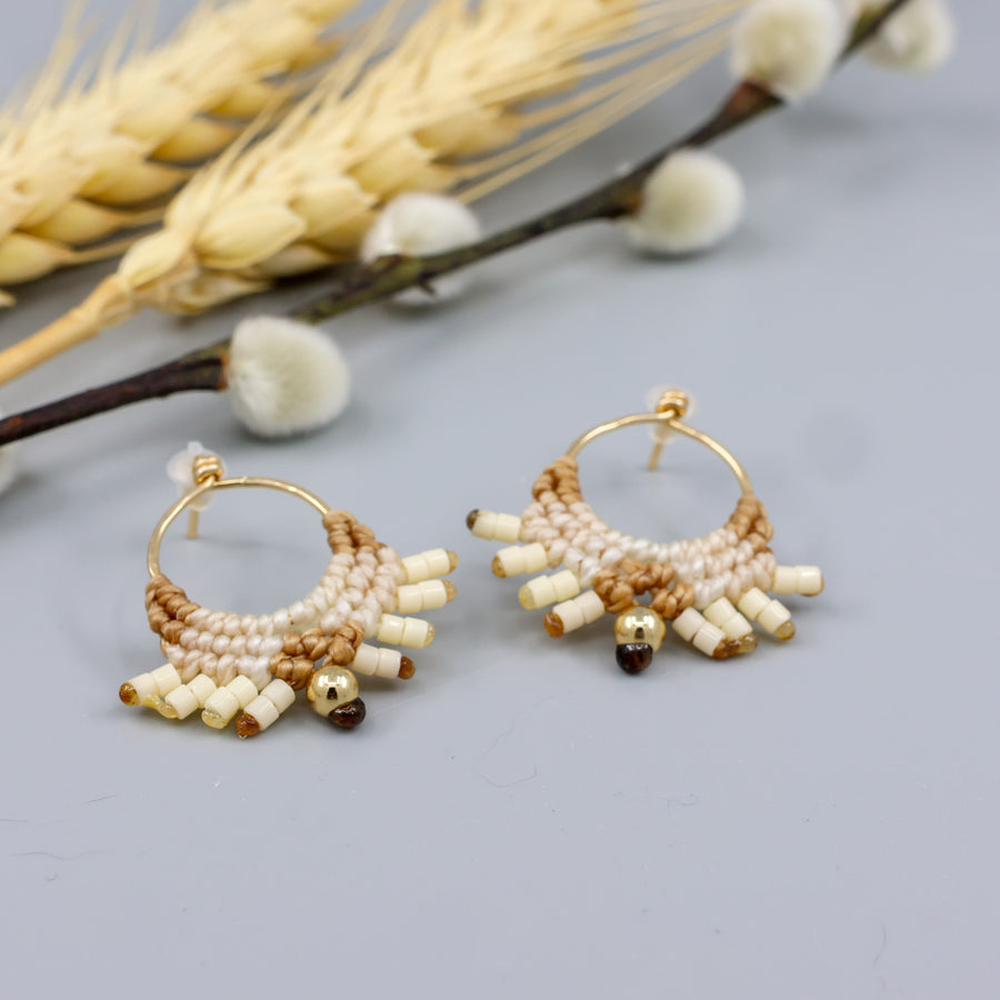 handmade gold fill macrame earrings in gold tones overhead view