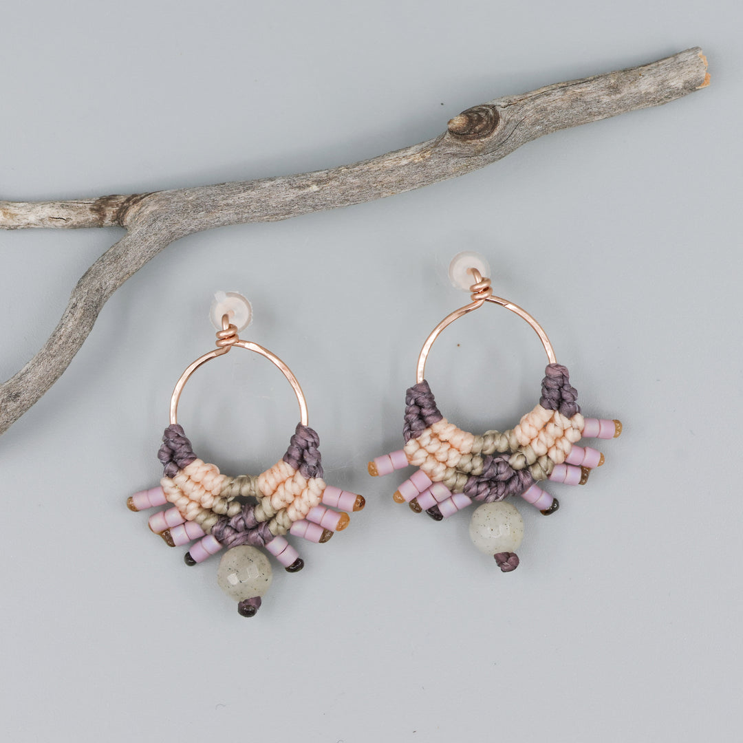 handmade macrame earrings in rose gold, peach and dusty purple with a labradorite bead