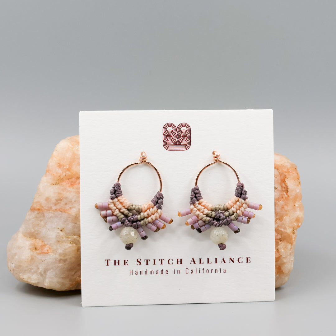 rose gold macrame earrings in peach and dusty purple with a labradorite bead