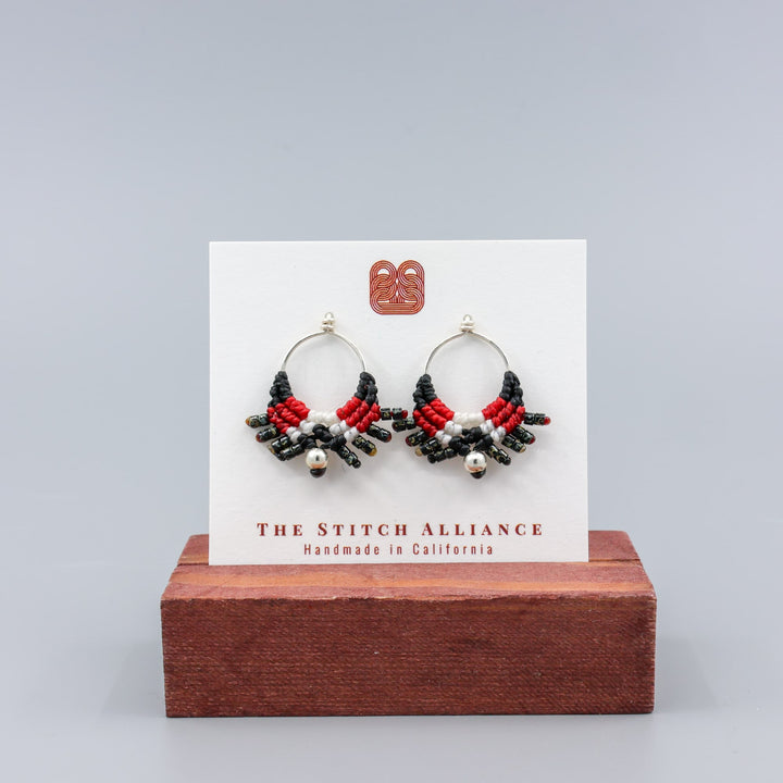 handmade, boho western macrame earrings - sterling silver on a white card