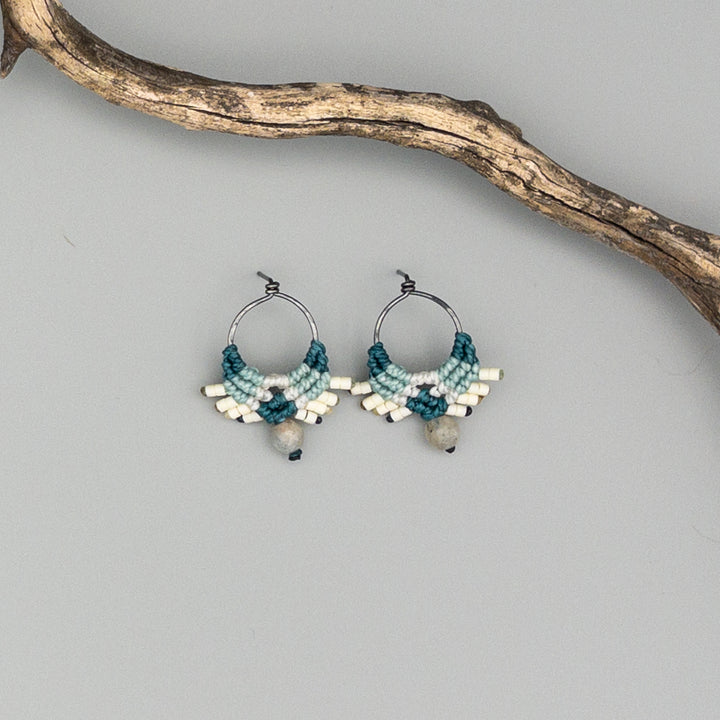 teal and mint green macrame earrings with labradorite beads in oxidized sterling silver on a gray background
