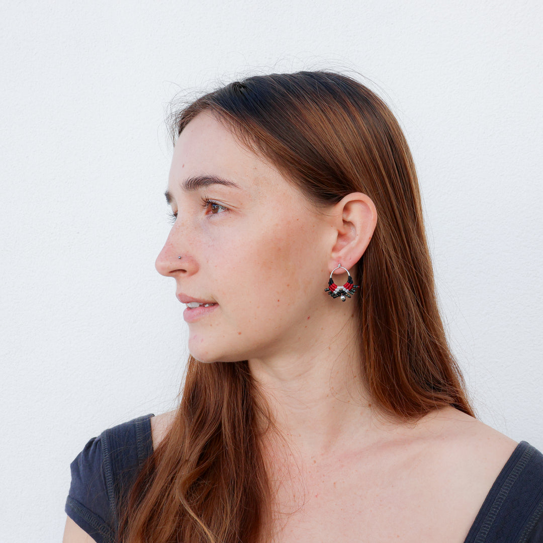 handmade sterling silver macrame earrings with black, red, and light gray cord