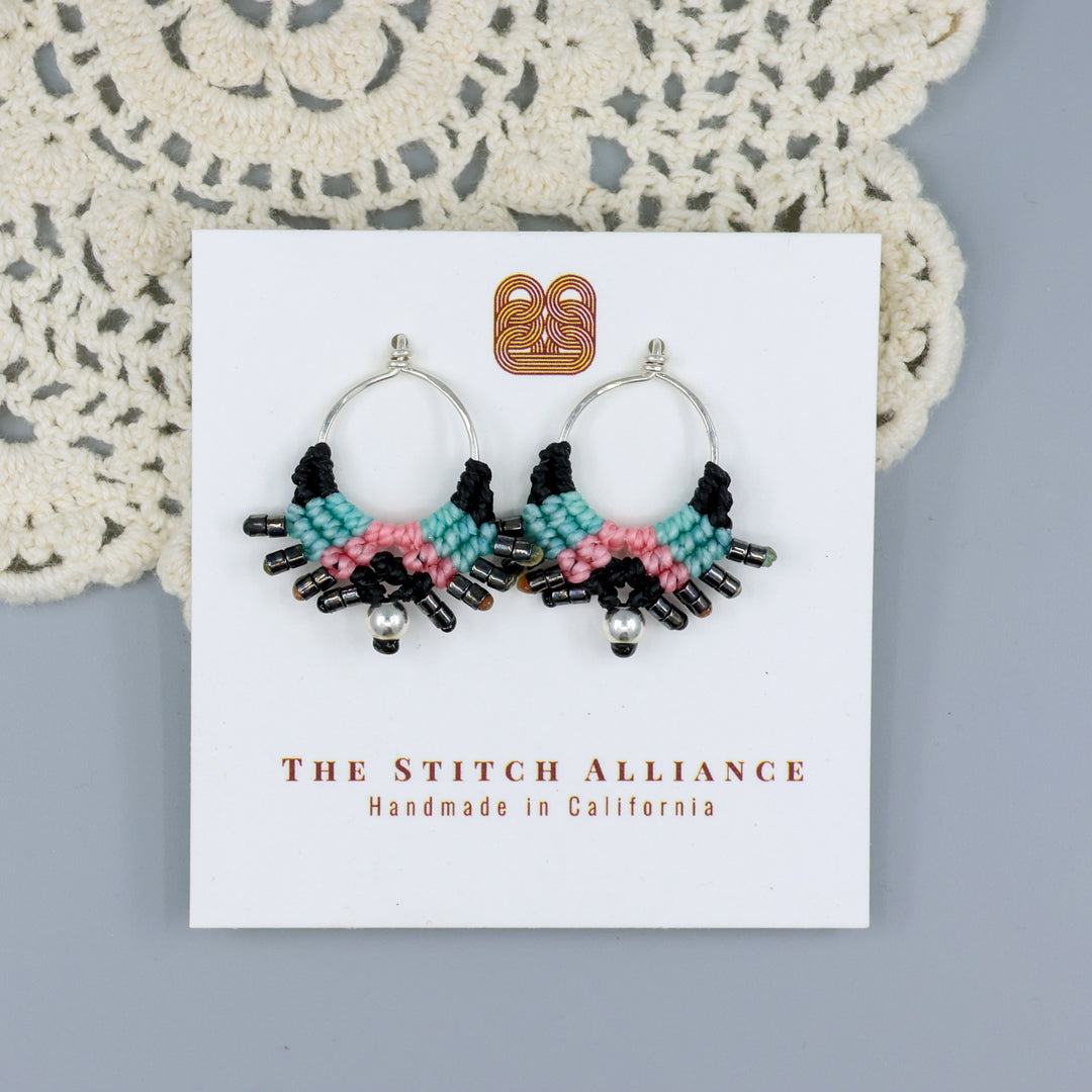 handmade sterling silver macrame stud drop earrings with black, blue, and pink on a white card