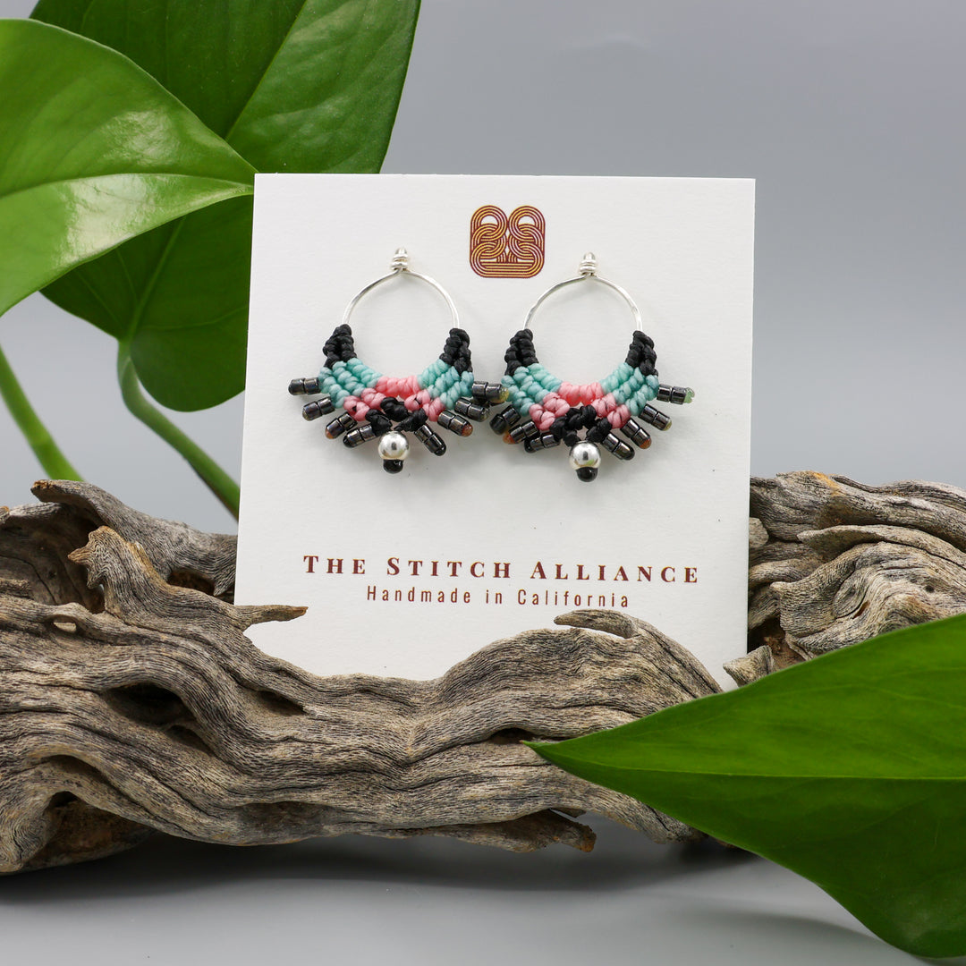 handmade sterling silver macrame stud drop earrings with black, blue, and pink on a white card
