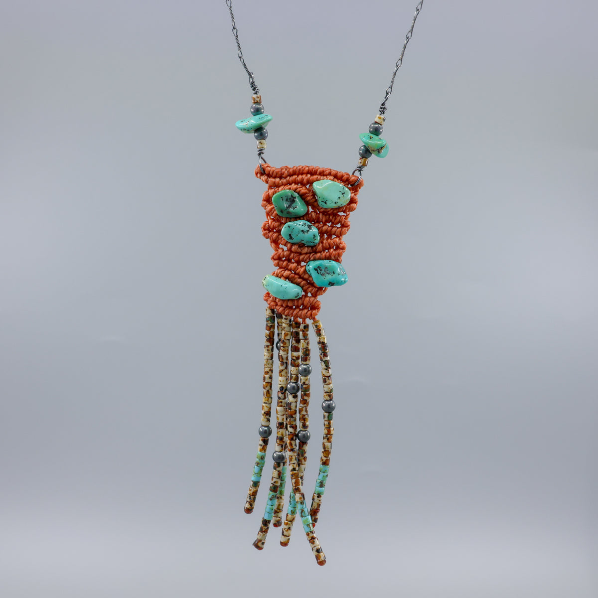 handmade macrame necklace with turquoise and seed beads