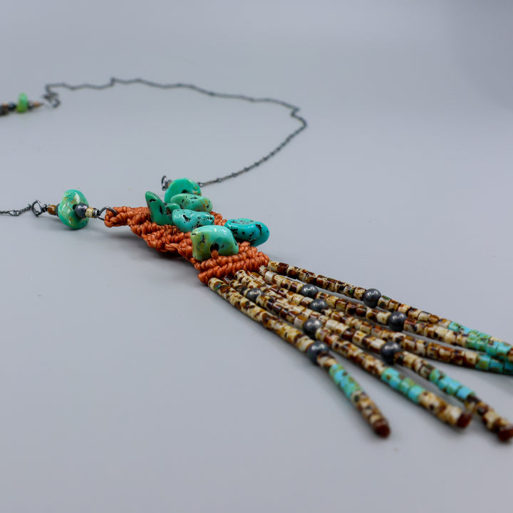 detail view handmade macrame necklace with turquoise and seed beads