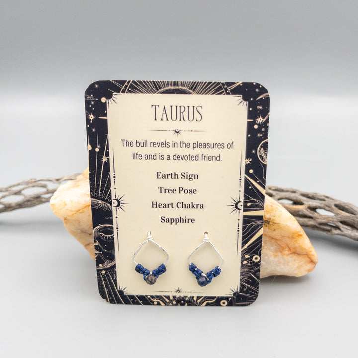 Taurus sapphire earrings in sterling silver front of card
