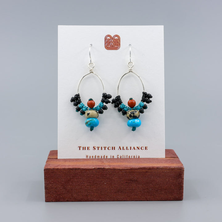 turquose and jasper handmade sterling silver macrame earrings on a white card