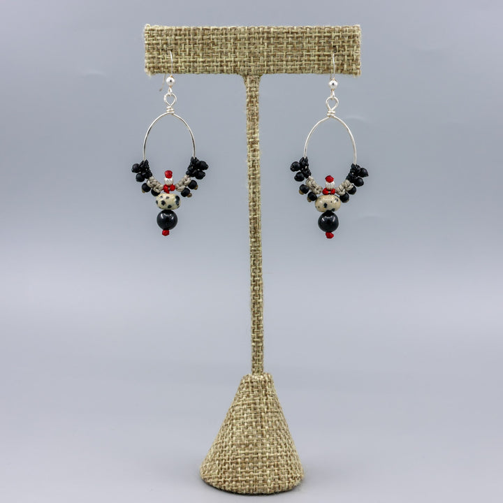 handmade, boho western macrame hoop earrings with jasper and spinel beads on a linen hanger