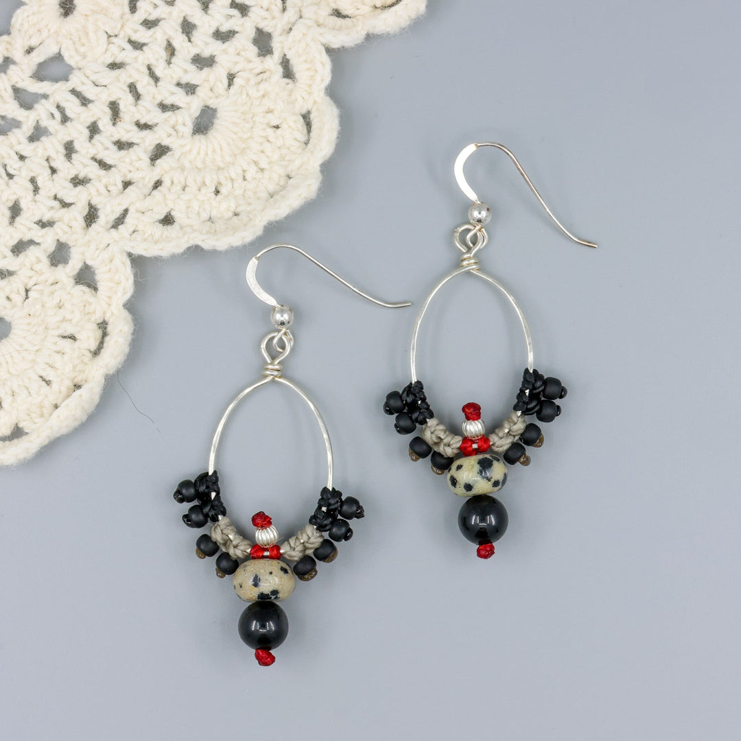 handmade, boho western macrame hoop earrings with jasper and spinel beads on a gray background