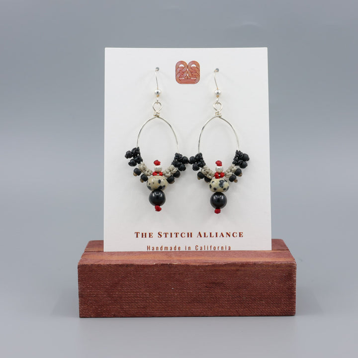 handmade, boho western macrame hoop earrings with jasper and spinel beads on a white card