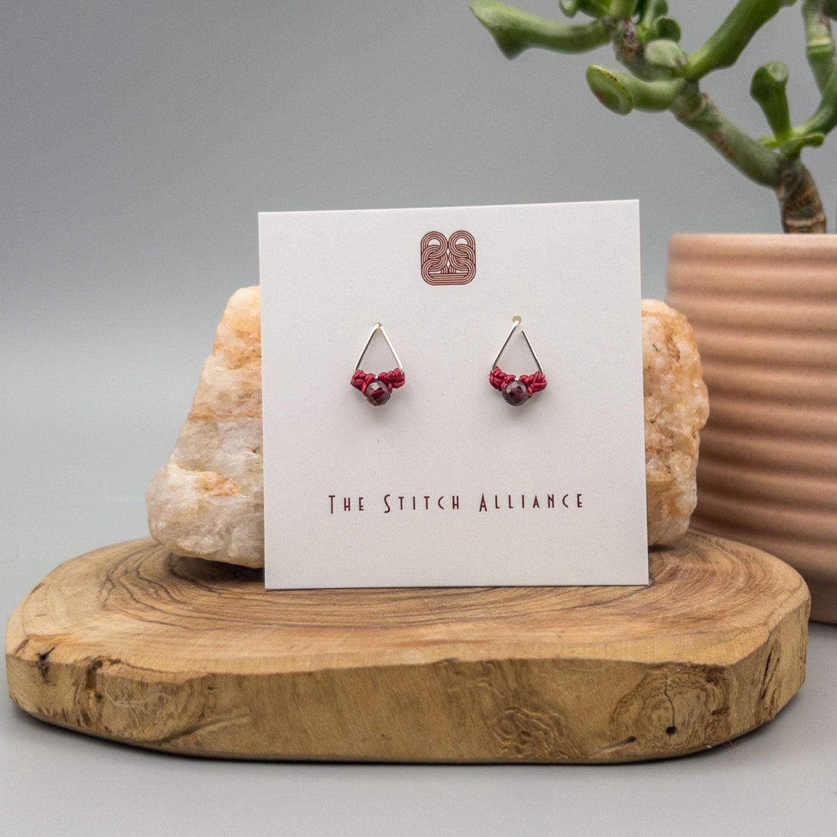 Sterling silver triangle post earrings with garnet beads