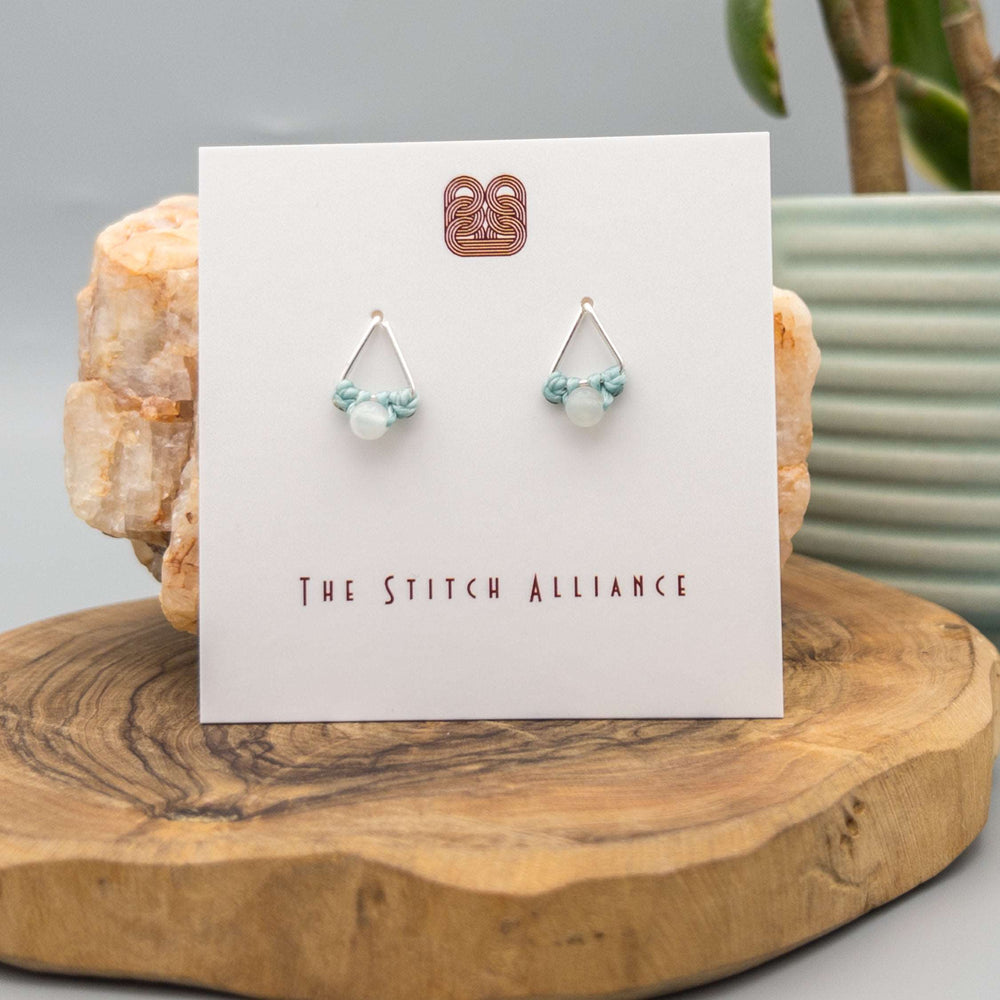 sterling silver triangle shaped post earring with a moonstone bead
