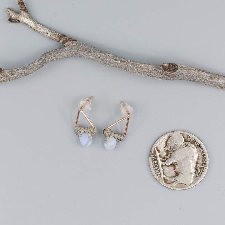 rose gold triangle earrings with blue lace agate beads with coin for size comparison