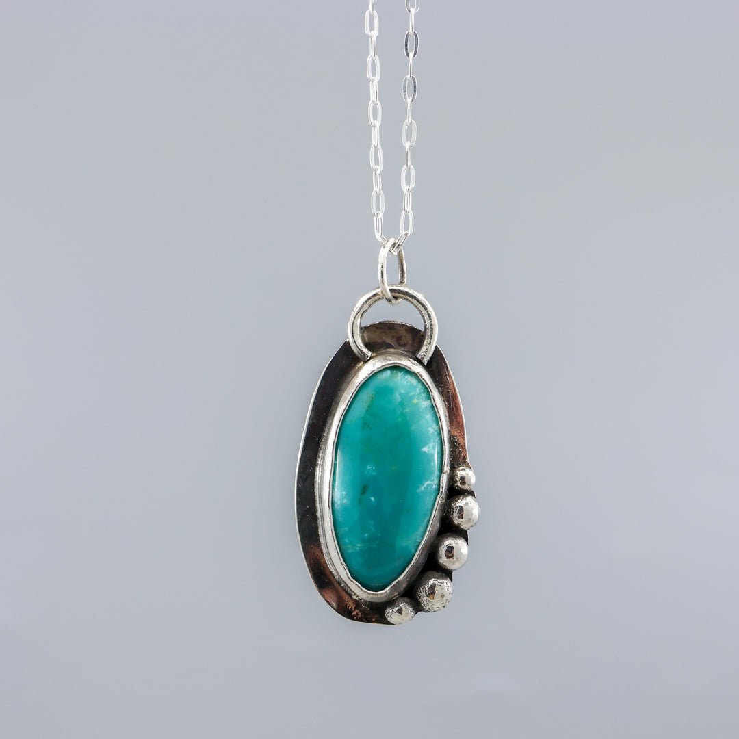handmade turquoise necklace sterling silver shown hanging