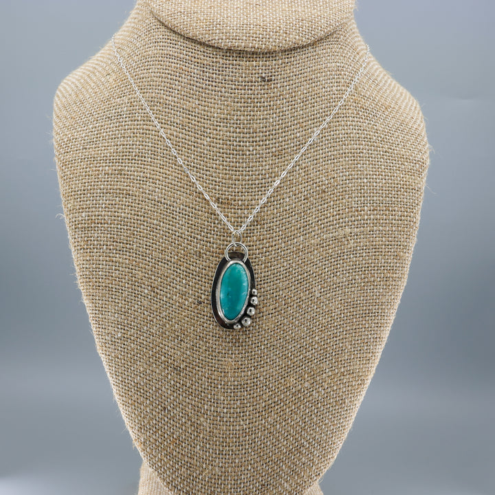 handmade turquoise necklace sterling silver on mannequin