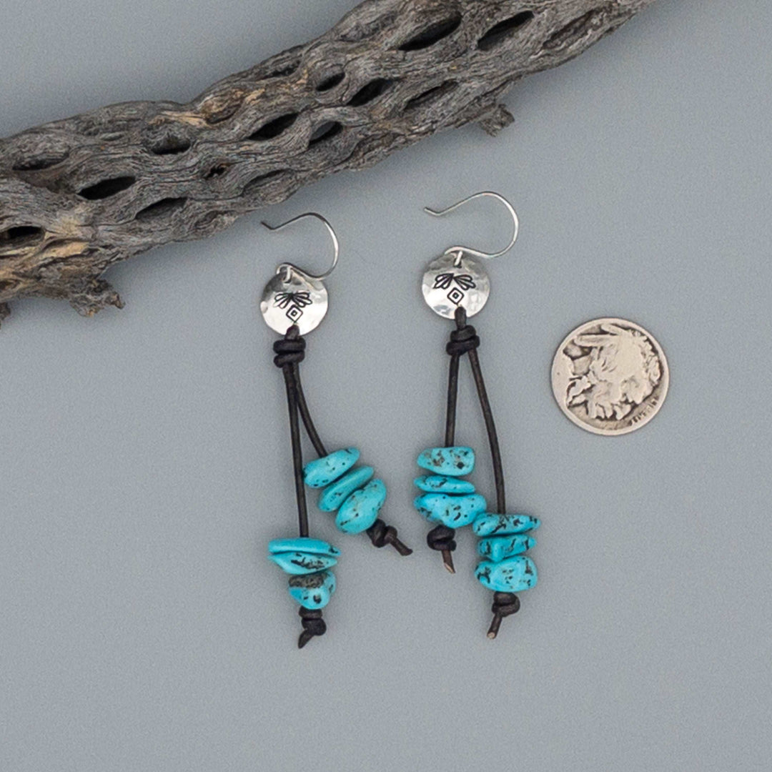 Handmade turquoise bead sterling silver earrings with nickle for size reference