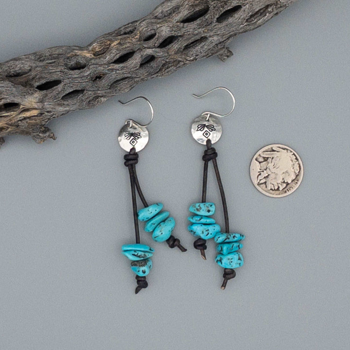 Handmade turquoise bead sterling silver earrings with nickle for size reference