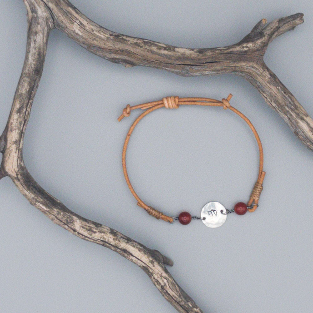 Virgo zodiac sign stamped on sterling silver disc bracelet with carnelian beads and leather cord